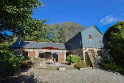 L'un des deux charmants chalets situés dans l'enceinte de Cusgarne House.