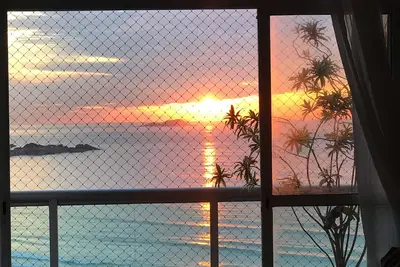 Image de Appartement en bord de mer à Pitangueiras avec vue sur les Asturies