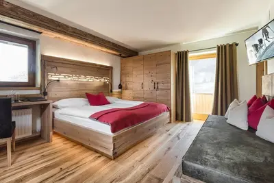 Image de Chambre quadruple - Naturhotel Der Alpenhof