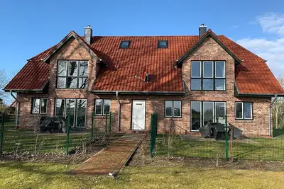 Image de Dünentraum, Ferienwohnung in \"De Feerjenhusen\" am Haubarg von Vollerwiek