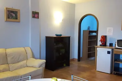 Image de Bel appartement dans villa avec terrasse.