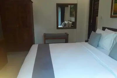 Image de Petite villa confortable au milieu d'une vue sur la jungle luxuriante