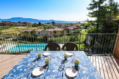Image de Pegaso: with lake view balcony, pool and private garge