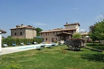 Image de Villa Vezzosa B: Un appartement confortable qui fait partie d'une ancienne ferme.