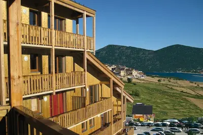 Image de Appartement Abordable 50m des Pistes | Accès Parking Couvert!