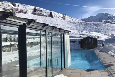 Image de 3 pièces cosy au pied des pistes, piscine chauffée extérieure, sauna, garage