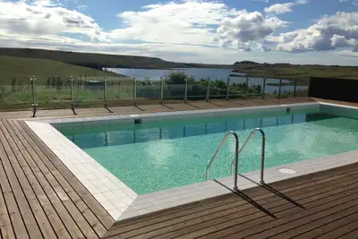 Image de Ferme sur un terrain de 700 acres avec piscine thermale géothermique.