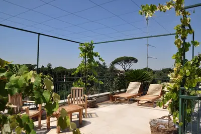 Image de Penthouse Domus Colosseo avec vue spectaculaire à 360 ° depuis le jardin sur le toit