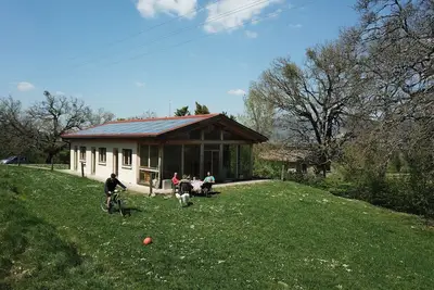 Image de Retino Wood House - wooden cottage with veranda - green energy