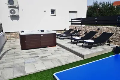 Image de Appartement de vacances avec climatisation et vue sur la mer