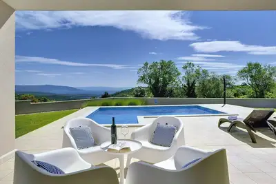 Image de Belle finca avec piscine privée et chaises longues