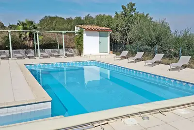 Image de Logement avec Vue Mer Et Montagne, toit terrasse, piscine et Spa. . .