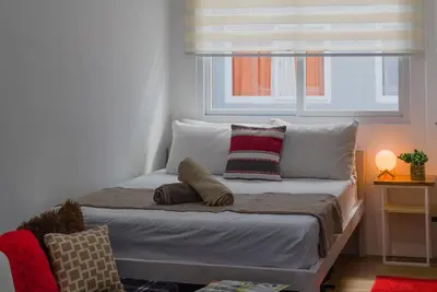 Image de Fantastique condo studio de 2 chambres à Mactan Cebu avec parking Gratuit, près des plages ★★★★★