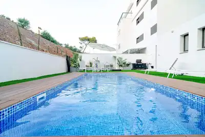 Image de Michealangelo- appartement de jardin de luxe avec piscine