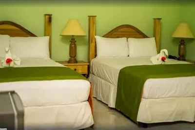 Image de Quadruple Deluxe 2, 2 grands lits, vue sur le jardin