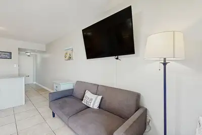 Image de Orange Beach, condo vue sur le golfe avec piscines partagées, courts de tennis et accès à la plage