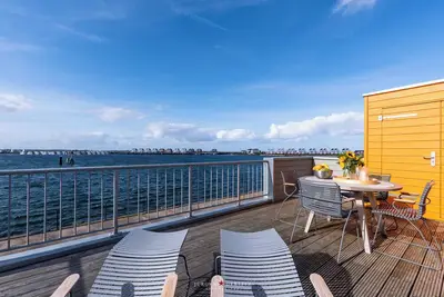 Image de Hafenkieker-Og: cheminée, terrasse, bain bien-être avec sauna infrarouge et bain à remous, vue sur la mer