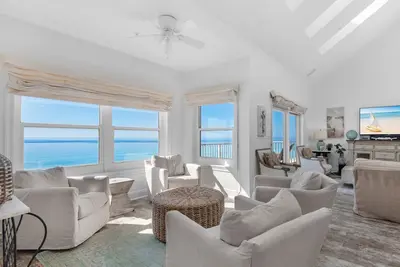 Image de Gulf Front, chaises de plage gratuites, parachute ascensionnel et croisière avec les dauphins