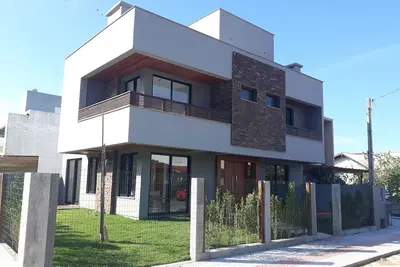 Image de maison panoramique près de la plage