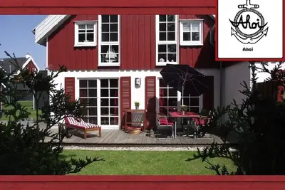 Image de Maison de vacances au coeur de Greetsiel avec bain à remous, sauna, cheminée et jardin