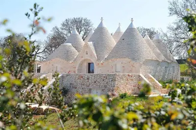 Image de Trullo Sereno- Villa de luxe avec piscine privée et vue imprenable sur la campagne