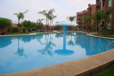 Image de Appartement tout confort, clim, piscine, jardin