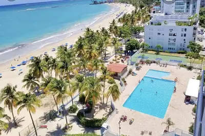 Image de Beach Front Condo 1 Bedroom Apt In Isla Verde. Upscale 5 Star. New Listing