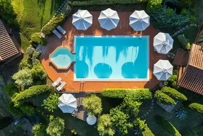 Image de Appartement avec climatisation, Wifi, piscine, Tv, terrasse, vue panoramique, près de San Gimignano
