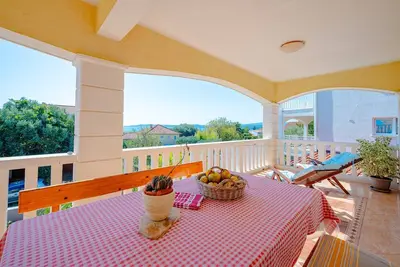 Image de Apartments Mladenka - Appartement 2 Chambres avec Balcon et Vue sur la Mer