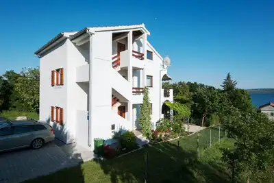 Image de Appartement 2 Chambres avec Terrasse et Vue sur la Mer