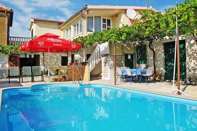 Image de Bel appartement avec piscine privée, Wifi, climatisation, Tv, terrasse, animaux admis et parking