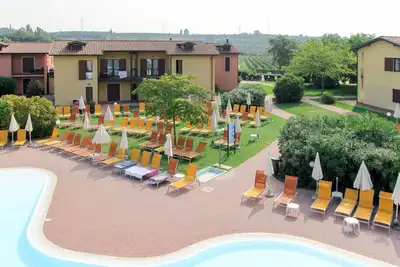 Appartement avec climatisation, Wifi, piscine, bain à remous, Tv, terrasse, animaux admis, parking