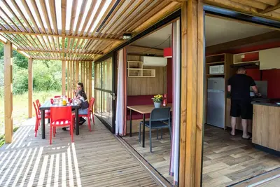 Image de Chalet Noumea (4-5 pers) 2 chambres - Tv - Clim - 2 transats - Terrasse couverte 5 personnes
