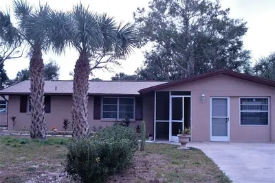 Image de 2 lits 2 bains maison avec piscine 2 miles aux plages du golfe