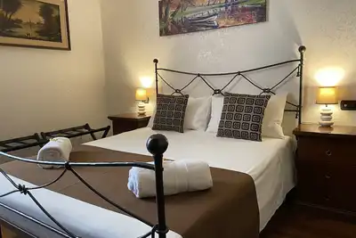 Image de Central and new apartment 15 min. from Colosseum - Metro Re di Roma - Free WiFi