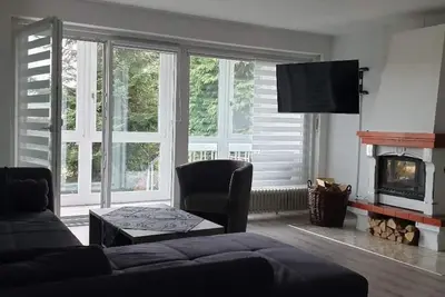 Image de Appartement moderne (130 m2) avec jardin d'hiver, terrasse et grand jardin