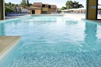 Image de Appartement dans une maison de vacances avec piscine, Wifi, Tv, terrasse, animaux admis, parking