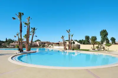 Image de Bel appartement dans une maison de vacances avec piscine, Wifi, Tv, terrasse, animaux admis, parking