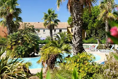 Image de Joli appartement dans une maison de vacances avec Wifi, piscine, Tv, patio, animaux admis et parking