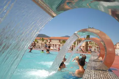 Image de Confortable appartement pour 8 personnes avec piscine, Wifi, Tv, terrasse, animaux admis et parking