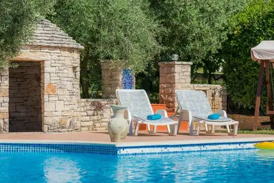 Image de Joli appartement pour 6 personnes avec Wifi, piscine, climatisation, Tv et patio