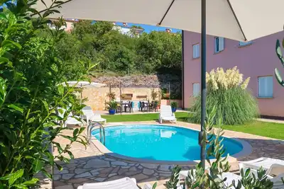 Image de Joli appartement pour 6 personnes avec piscine, climatisation, Wifi, Tv, terrasse et animaux admis