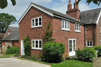 Image de Maison de ferme Cottage. .