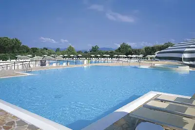 Image de Joli appartement dans une maison de vacances avec climatisation, Wifi, piscine, Tv et terrasse