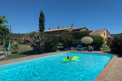 Image de Véritable Ferme Saturnia avec Piscine