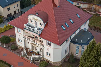 Image de Villa Hünlich - Appartement avec balcon et vue magnifique sur la Haute-Lusace