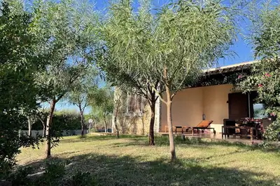 Image de Domo Sara, maison avec jardin avec vue sur la mer