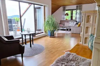 Espace de vie romantique sur 84m2 avec une vue panoramique sur la Suisse franconienne
