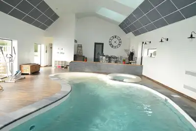 Image de Gite tout confort avec accès piscine couverte et chauffée + jacuzzi