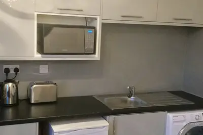 Image de Central Stylish Townhouse 3 appartements séparés dans un seul bloc pour jusqu'à 10 personnes